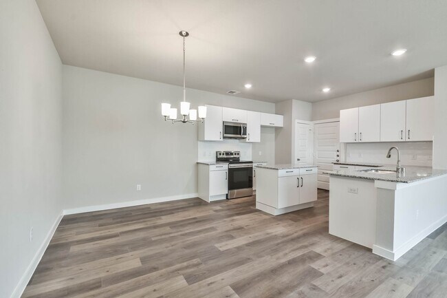 Building Photo - High Ceilings, Low Maintenance -Say Hello ...