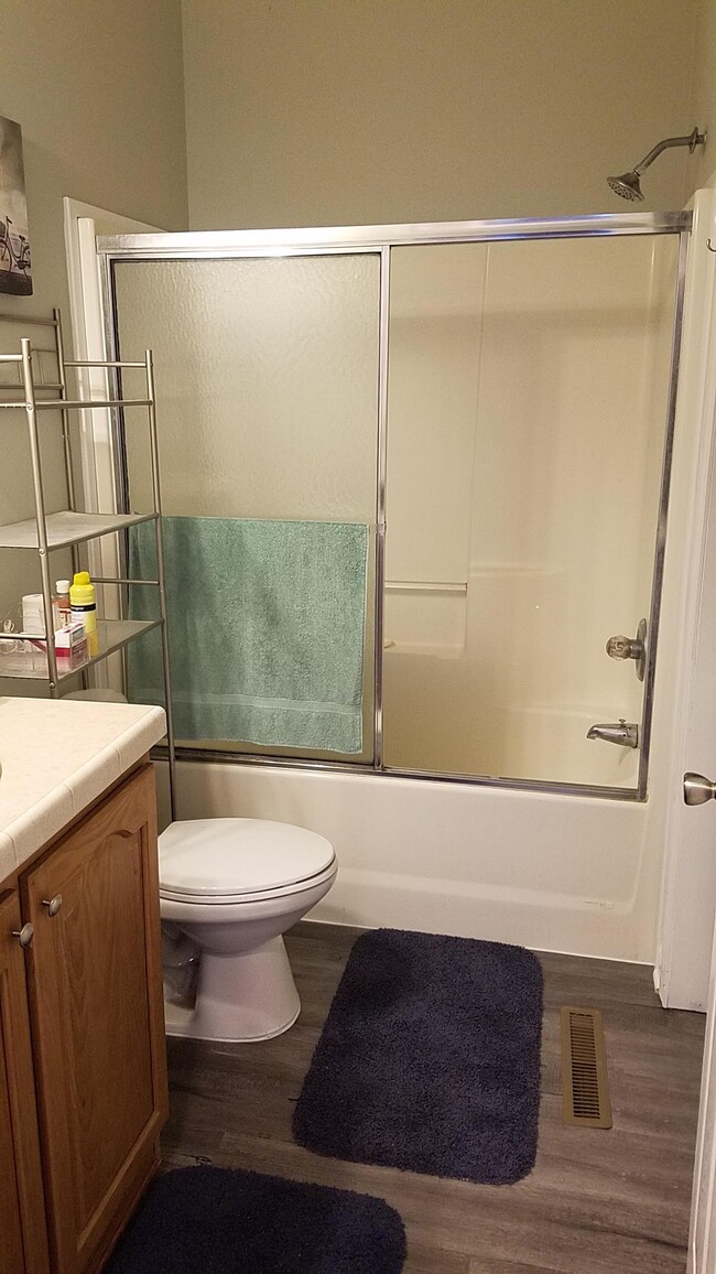 Downstairs bathroom on hallway across from bedroom. - 221 Long St