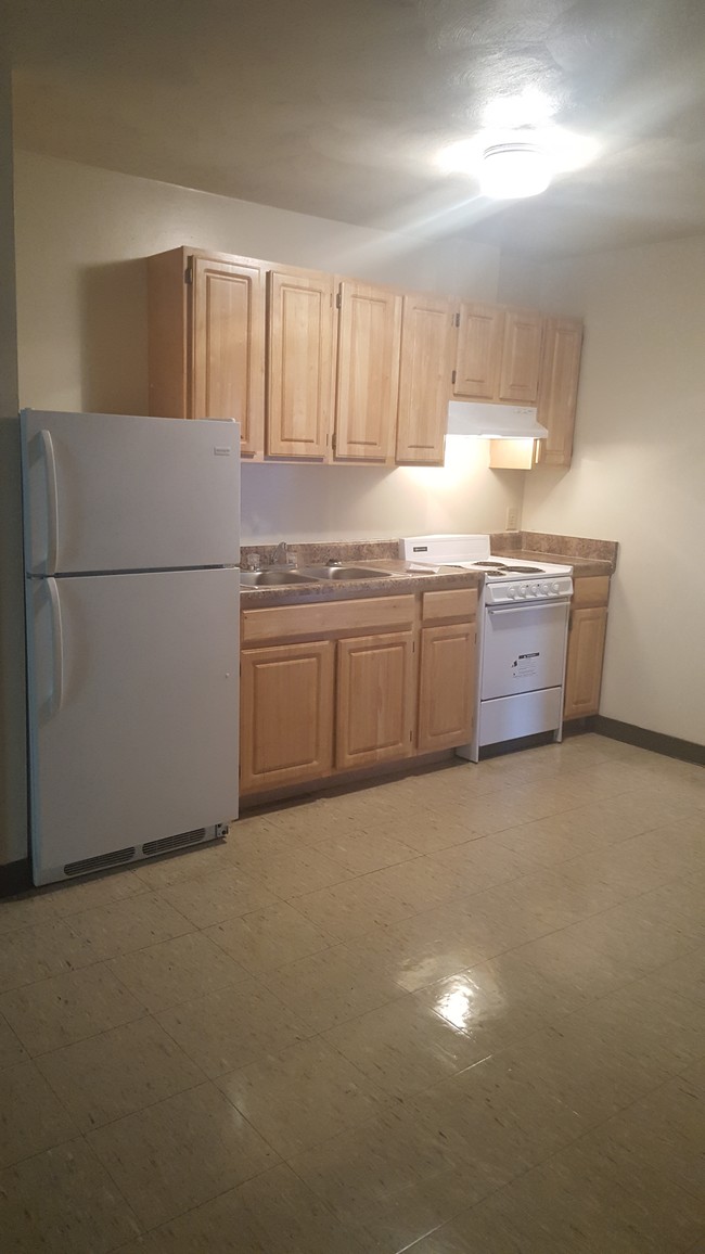 One Bedroom Kitchen - University Towers