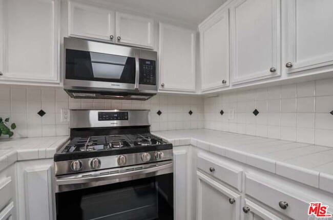 Building Photo - 4750 Templeton St