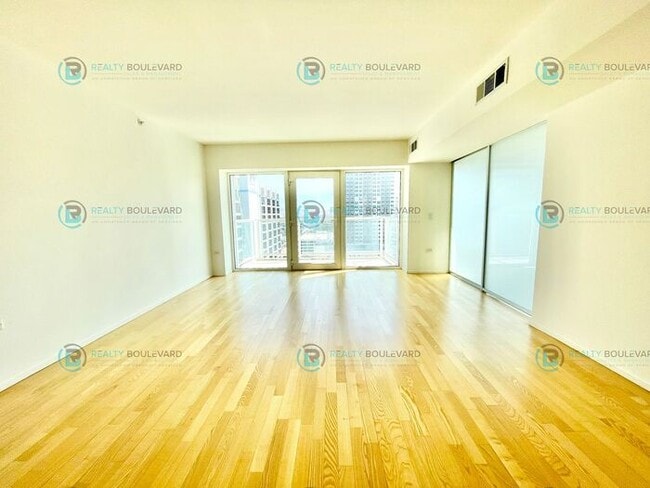 Building Photo - Modern 1 Bedroom 1 Bath Luxury Condo at Th...