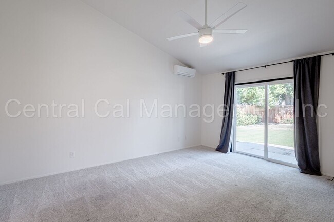 Building Photo - 4 Bedroom/2 Bath Home with a Pool and Sola...