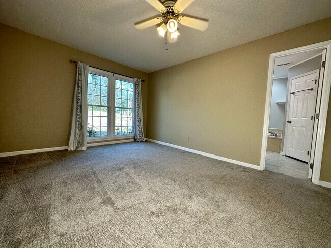 Building Photo - Spacious 4-Bedroom Home with Bonus Room & Exceptional Amenities
