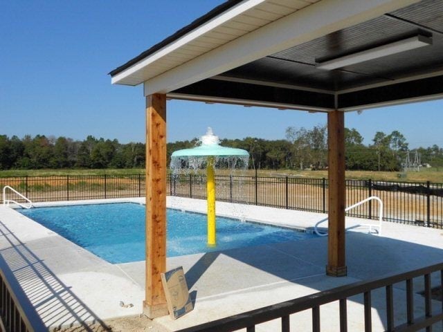 Building Photo - Modern 4BR Home with Open Layout, Granite Counters & Community Pool Access