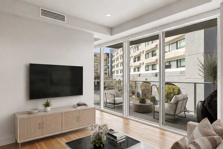 Virtually staged living room and balcony - 4422 N 75th St