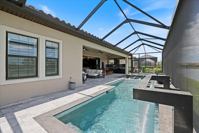 Building Photo - Luxury Home w/ Pool, Outdoor Kitchen, Car Lift, & Water View In Parrish!