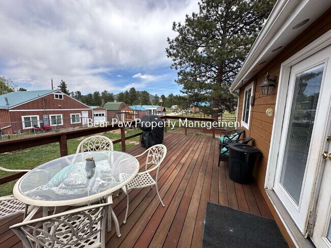 Building Photo - "Charming 3-Bedroom Retreat in Scenic Evergreen!