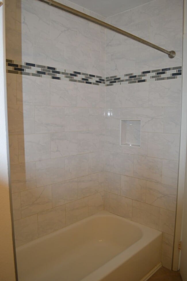 Building Photo - Four Bedroom, Two Bathroom Single Story Home With Two Car Garage