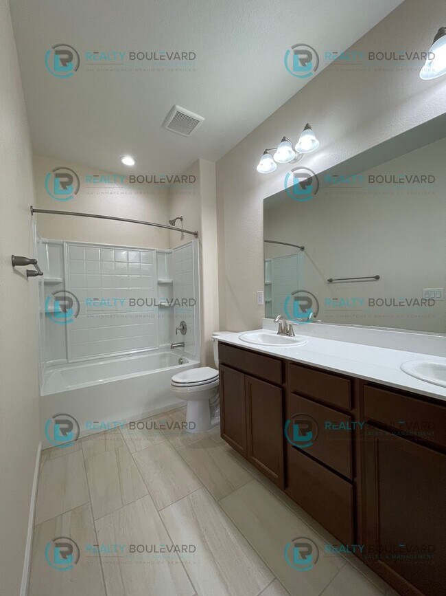 Building Photo - Luxury and Convenience Fully Equipped 3-Bedroom 2.5 Bathroom 2 Car Garage Townhome in Carson City