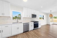 Building Photo - 9411 Jamaica Dr