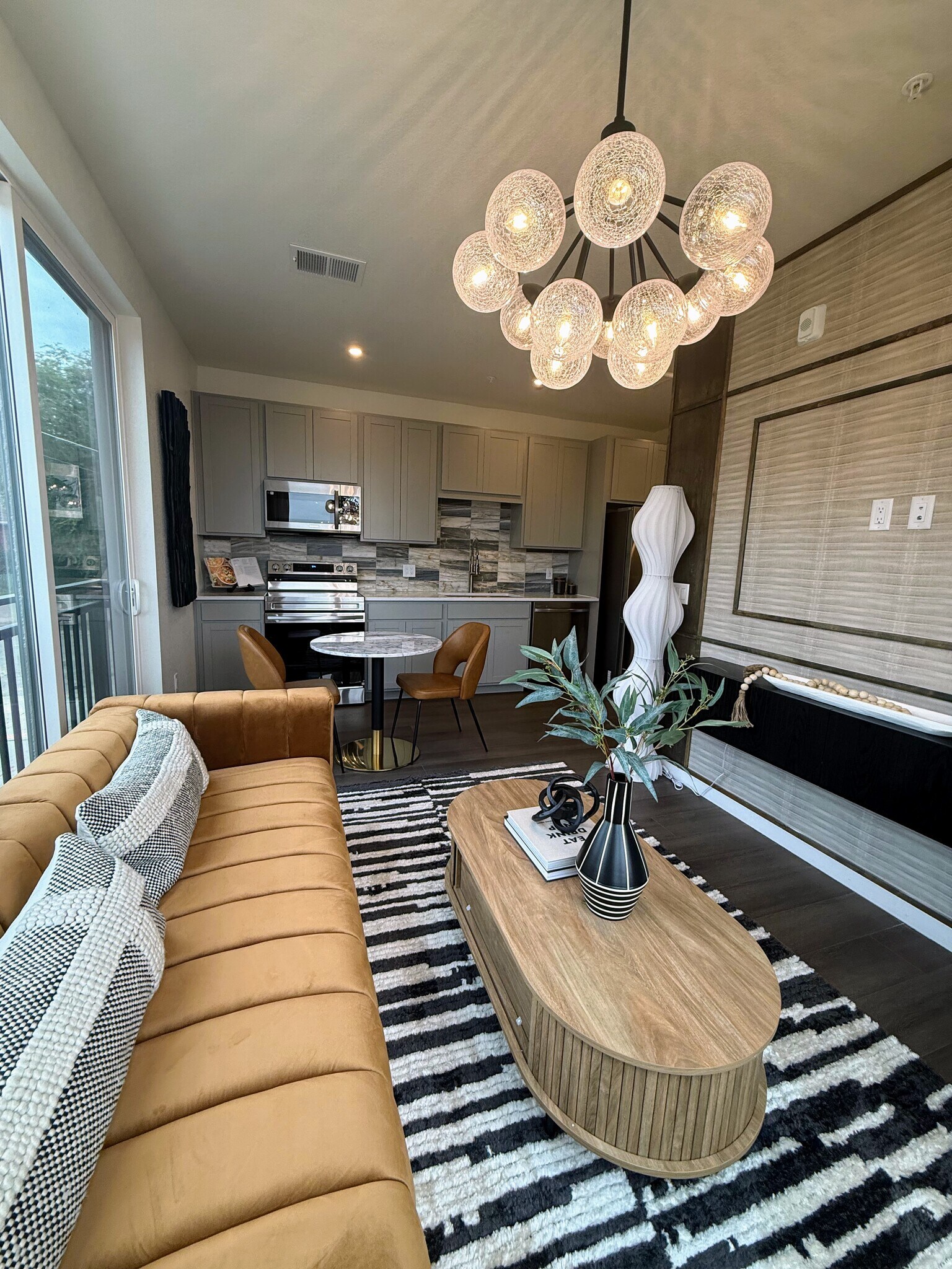 Model Living Room. For display purposes only. Furniture not included and finishes may vary. - 1650 Sheridan Blvd