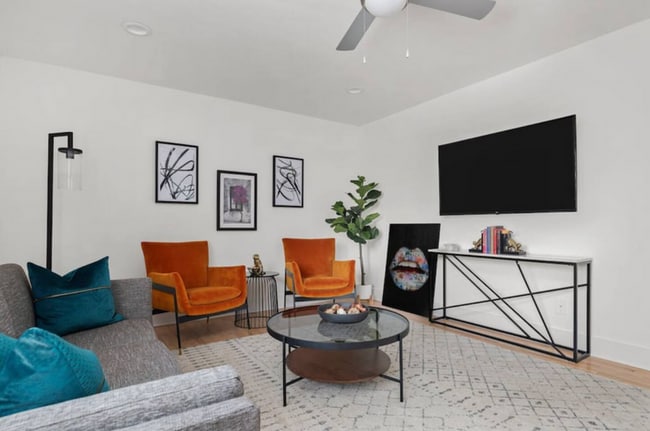 Living area with TV view - Crescent Apartments