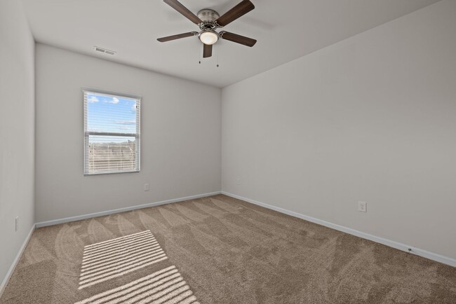Building Photo - Spacious 5 Bedroom Home with 2-Car Garage,...
