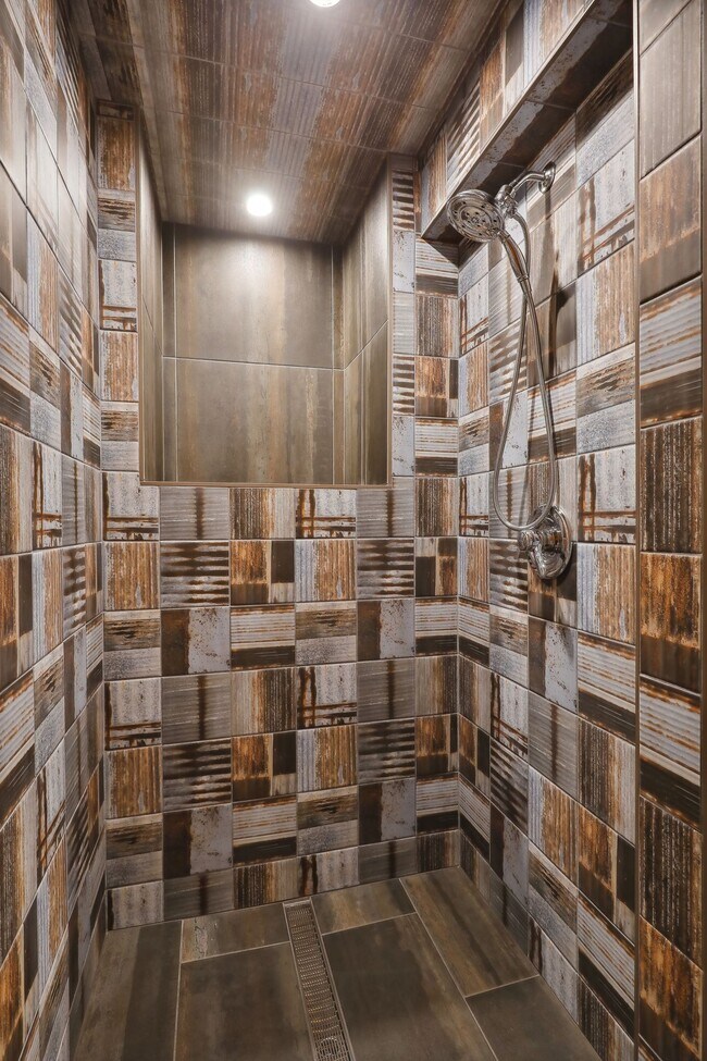 Linear stainless steel shower drain and custom shelf. - 924 Eleanor Ave