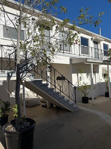 Two upper apartments in the back - 2401 Oak St