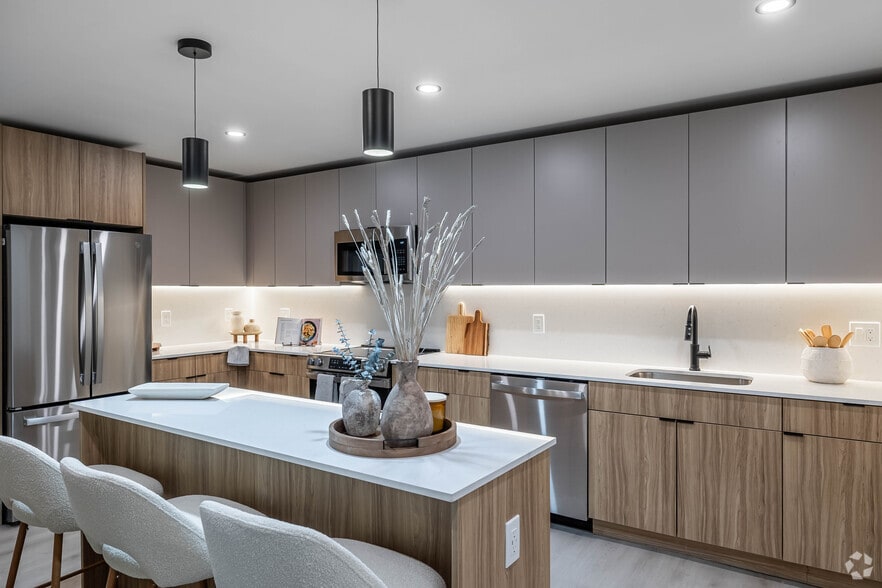 1 BR, 1 BA - 835SF - - Kitchen - Village Crossing