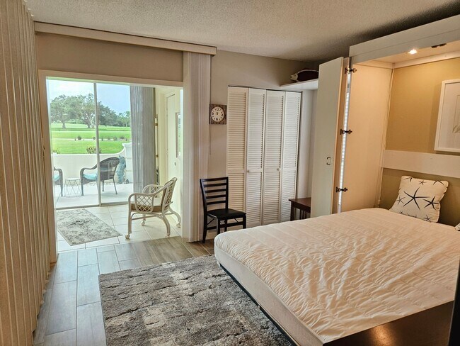 Building Photo - Charming First-Floor Condo in Plantation Golf and Country Club with a Community Pool Access!