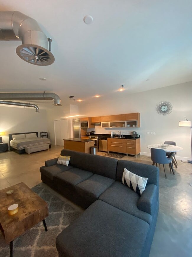 Building Photo - Stunning Fully Furnished Loft with Breatht...