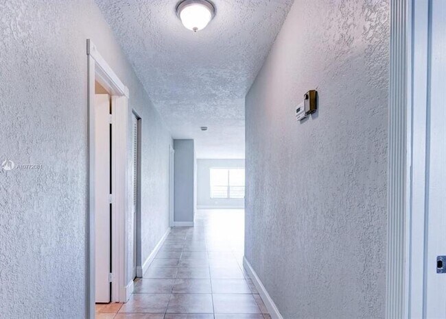 Building Photo - 7435 Woodmont Ter