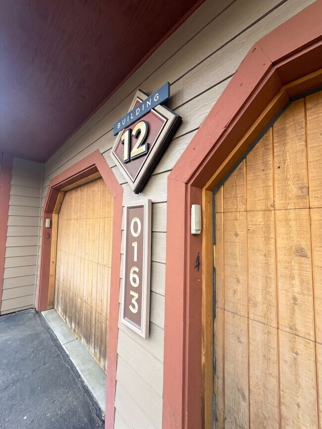 Building Photo - Two-Bedroom Condo with Attached Garage, Available Now