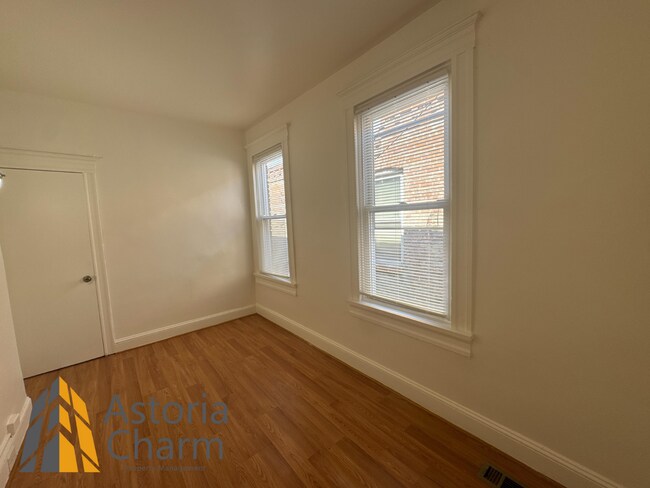 Building Photo - Comfortable 3-Bedroom with Hardwood Floors...
