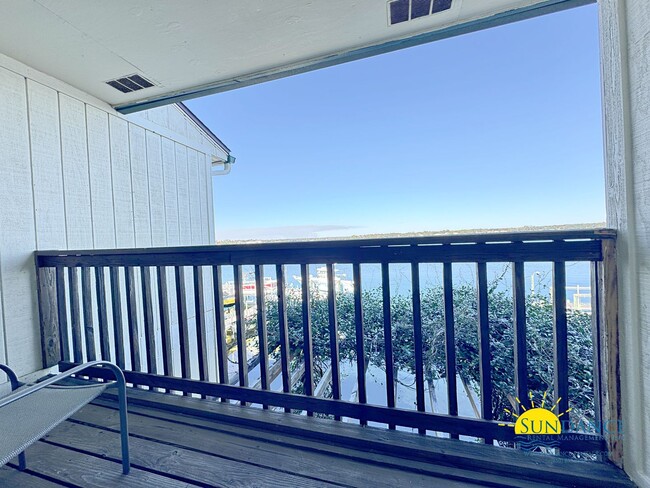 Building Photo - Waterfront Luxury Living on Garniers Bayou with Boat Slip/Lift Included!