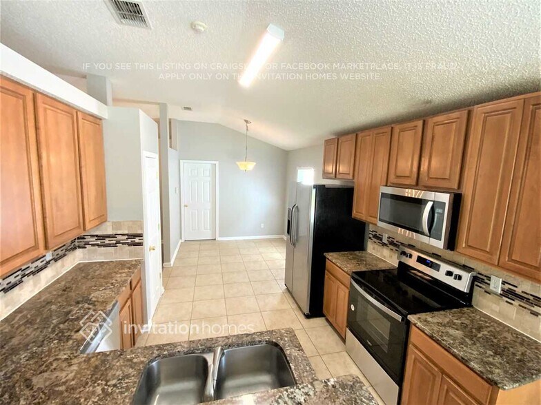 Building Photo - 1623 Canopy Oaks Dr