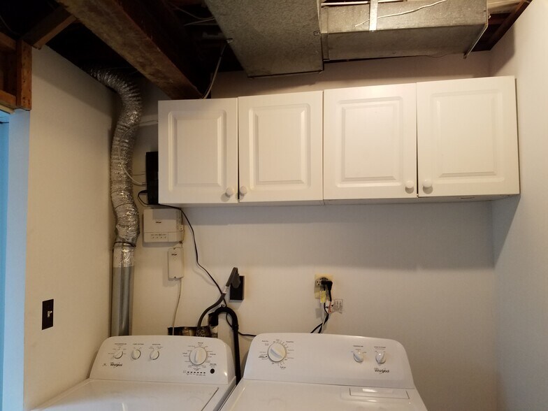 Cabinets above Washer Dryer - 6329 Fenestra Ct