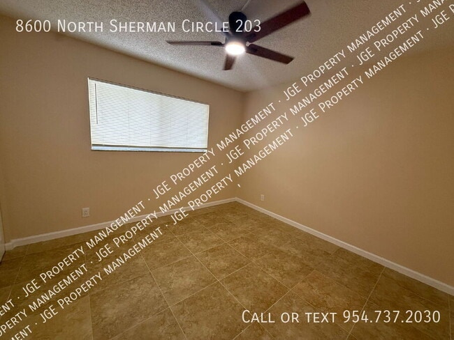 Building Photo - 8600 N Sherman Cir