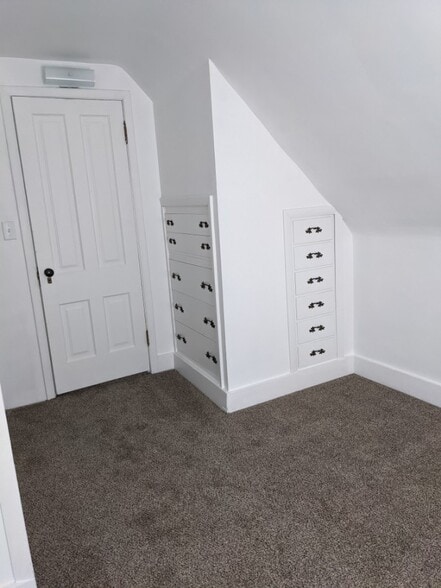 Bedroom with built-ins and brand new carpeting - 525 30th St