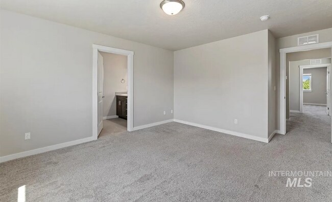 Building Photo - Stunning 4-Bedroom Home with Privacy & Low-Maintenance Living in Verado