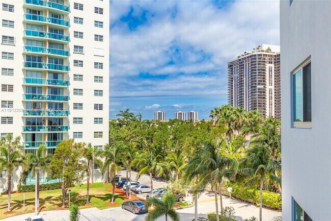 Building Photo - 19380 Collins Ave