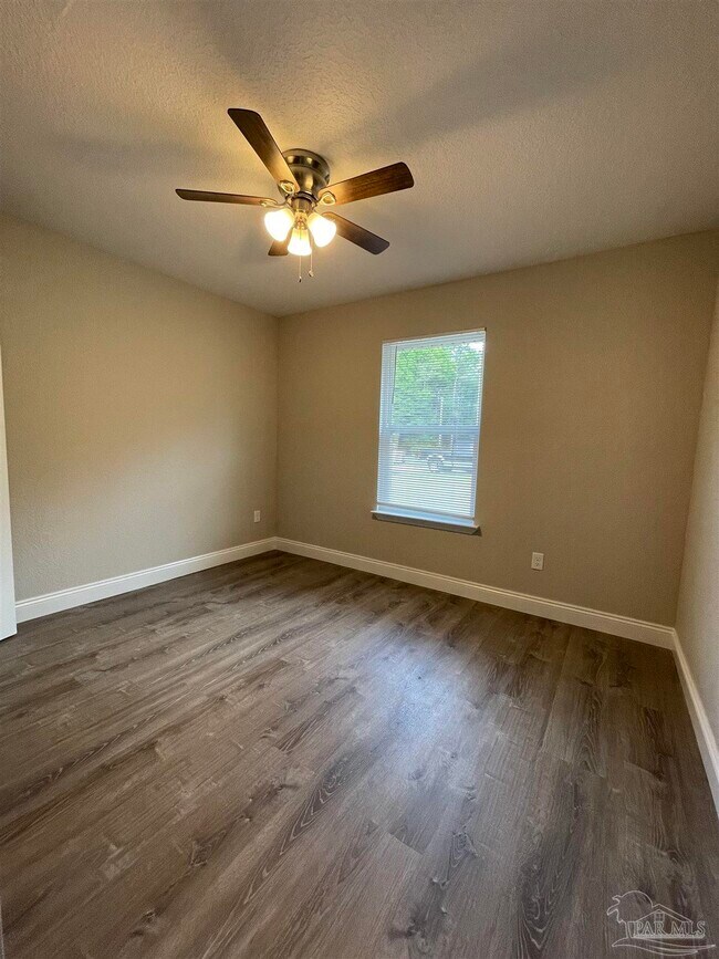 Building Photo - 6868 Branding Iron Ln