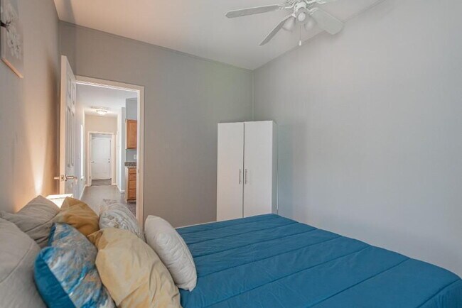Building Photo - The Gun Club | Make yourself at home in this West-Side Reservoir Park Home, a 5-minute walk to bu...