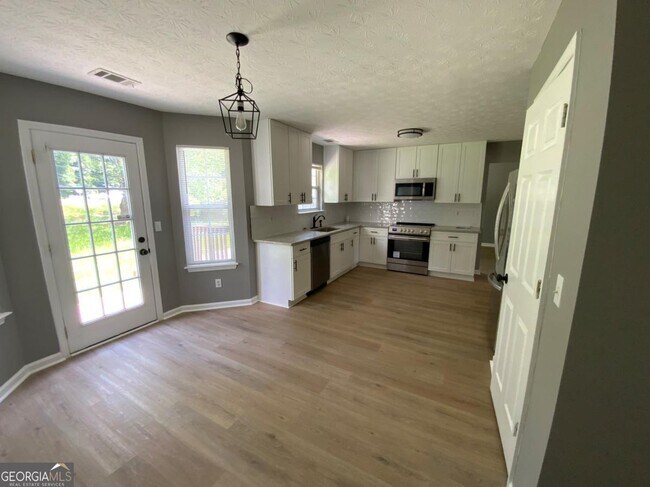 Building Photo - 6506 Chestnut Lake Crossing