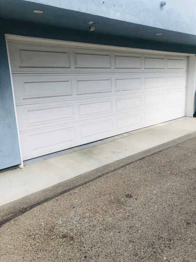 Garage parking for 1 car plus storage and spare fridge. - 232 Market St