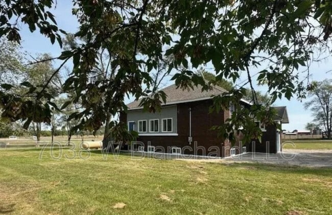 Building Photo - 7038 W Blanchard Rd