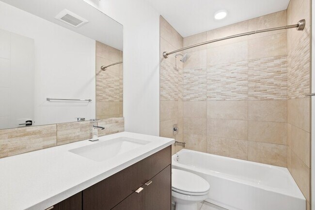 Building Photo - Impeccable Greenwood Townhome with Air Con...