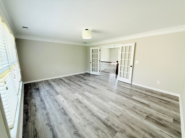 Building Photo - 8615 Village School Dr