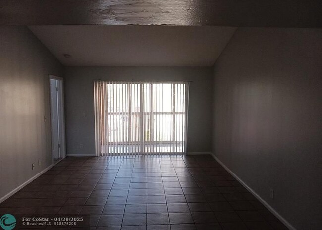 Building Photo - 2421 NW 56th Ave
