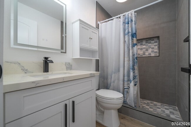 Building Photo - Rarely available ground floor townhome unit! 2 bdrm/2 bath/1 parking at Waiau Gardens Villa in Pe...