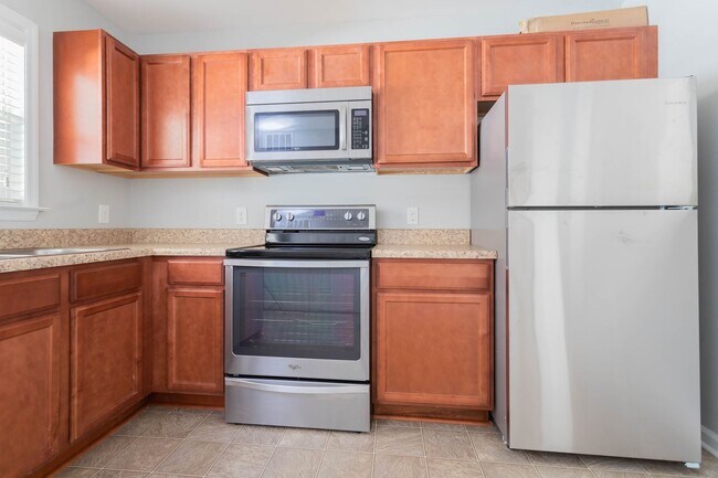 Building Photo - COMING SOON- Beautiful townhome in Carolin...