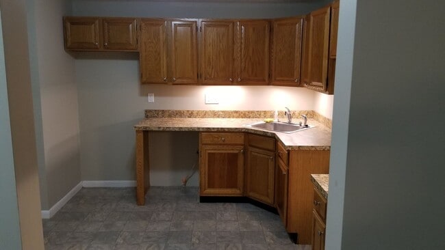 Building Photo - First floor, garden style condominium