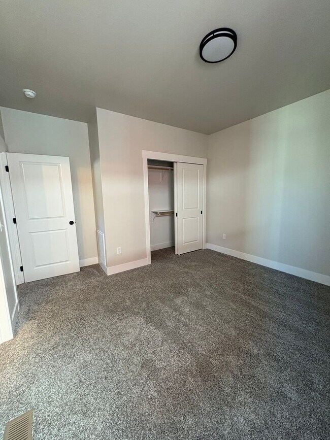 Building Photo - New construction townhome – two bed two bath with garage