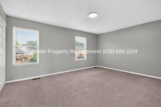 Building Photo - Charming 2-Bedroom Condo Available for Rent in Saint Peters!