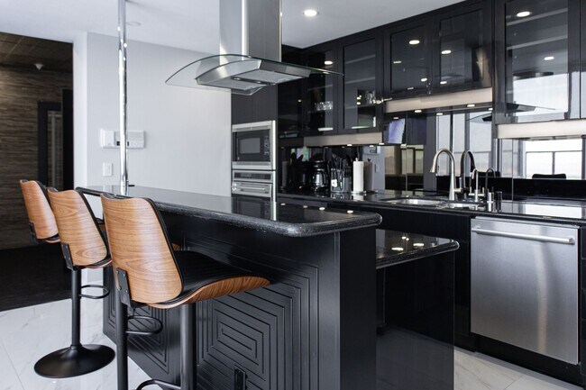 Building Photo - Luxury Penthouse Retreat with Private Pool, Sauna & Strip Views