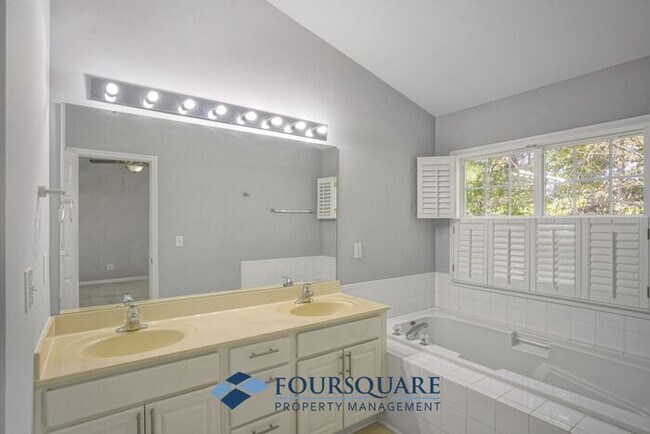 Building Photo - Lakefront Townhome with 1st Floor Bedroom, Fireplace & 2-Car Garage – In Raleigh