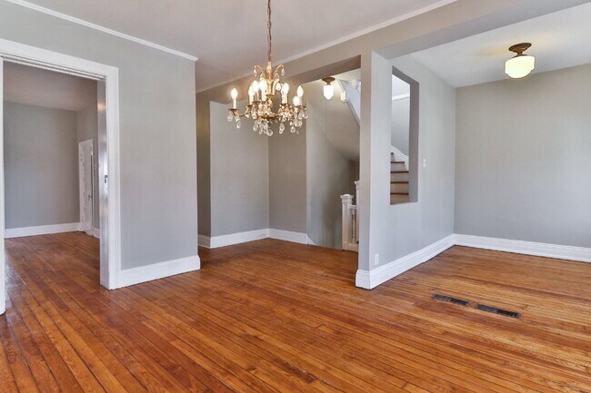 Building Photo - "Spacious 3-Bedroom Duplex with Classic Charm & Modern Comforts at 3438A Magnolia Ave!"
