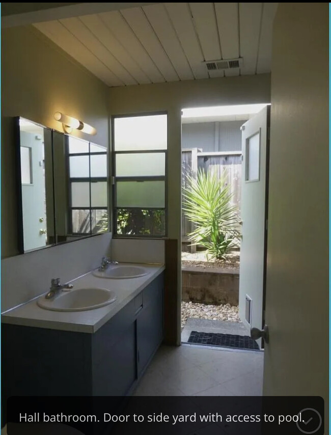 hallway bathroom with tub - 20 Arcangel Way