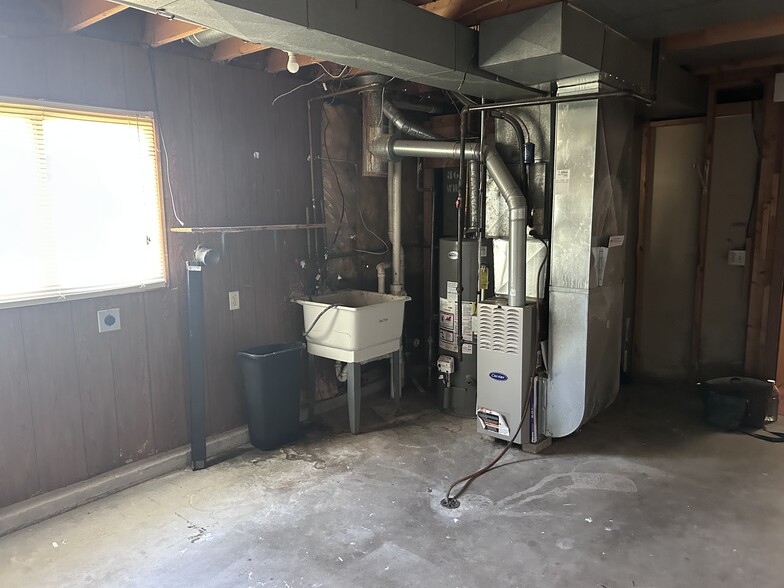 Basement with washer and dryer hookup - 1230 S Thompson Dr
